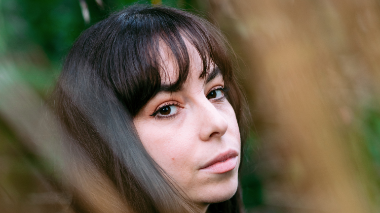 A rounded image depicting Holly Fraser, Editor-in-Chief WePresent, WeTransfer